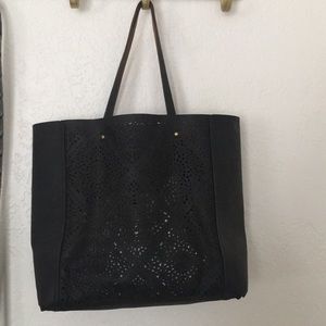 Reversible brown and black tote. Vegan leather